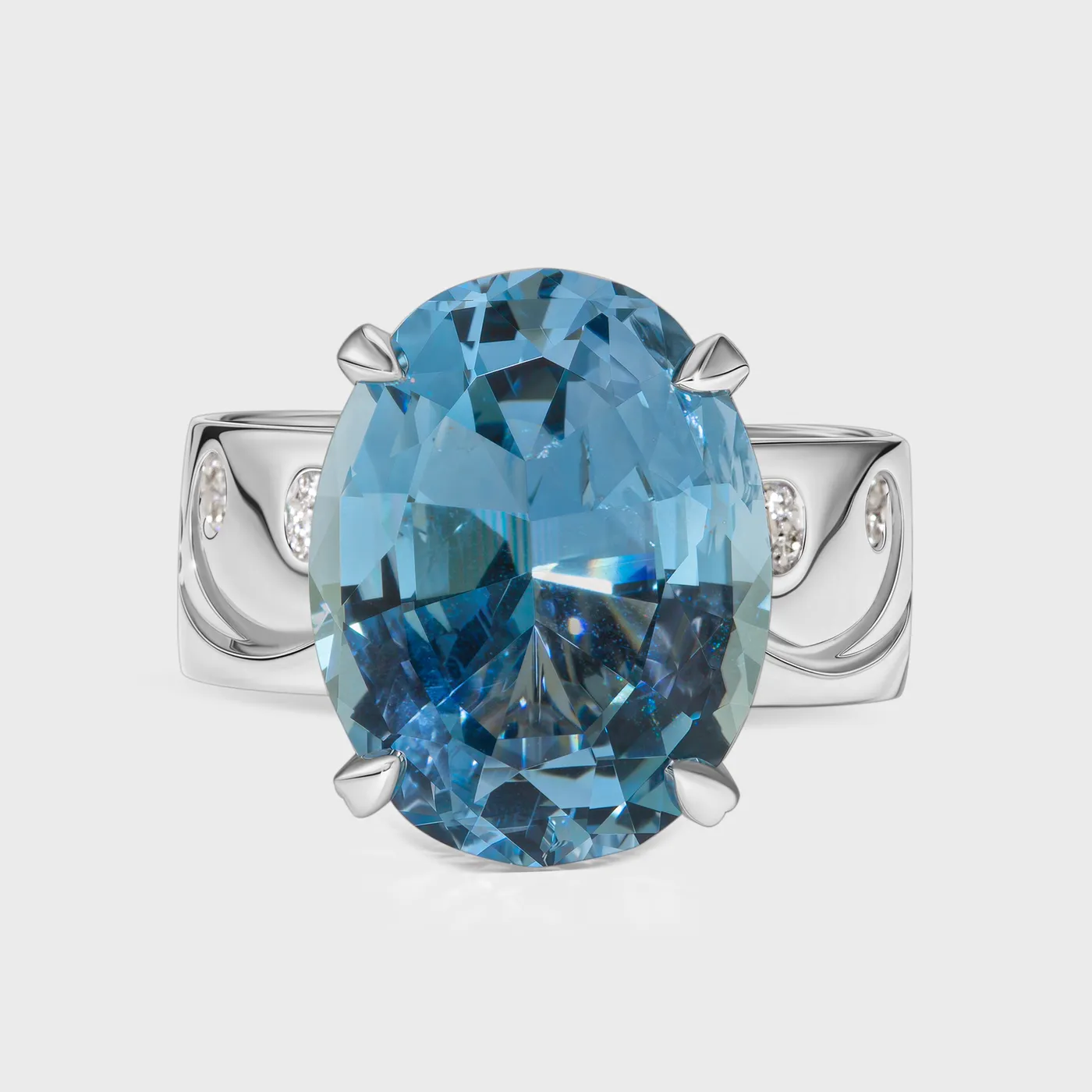 Chambord white gold ring by ValeOro with a large oval blue aquamarine in a four-prong setting, front view