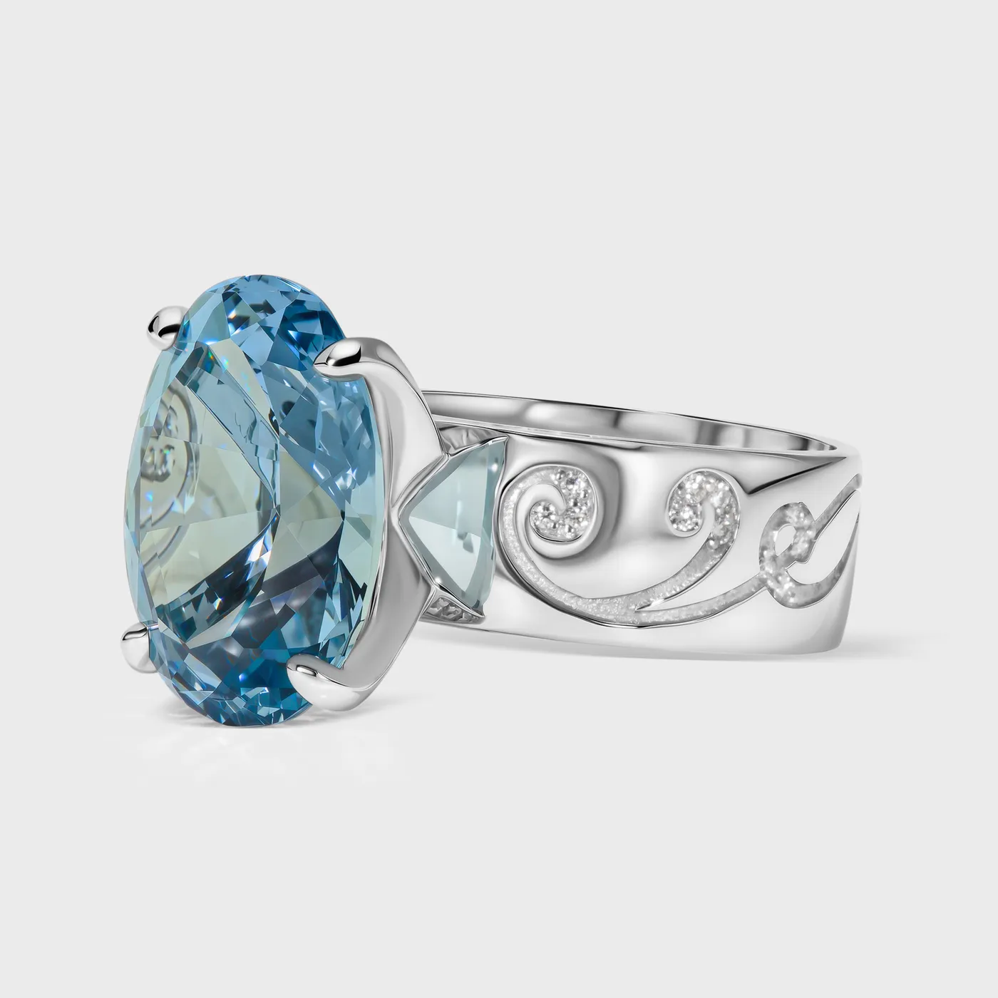 Chambord white gold ring by ValeOro with an oval blue aquamarine and a scrollwork band set with diamonds, three-quarter view