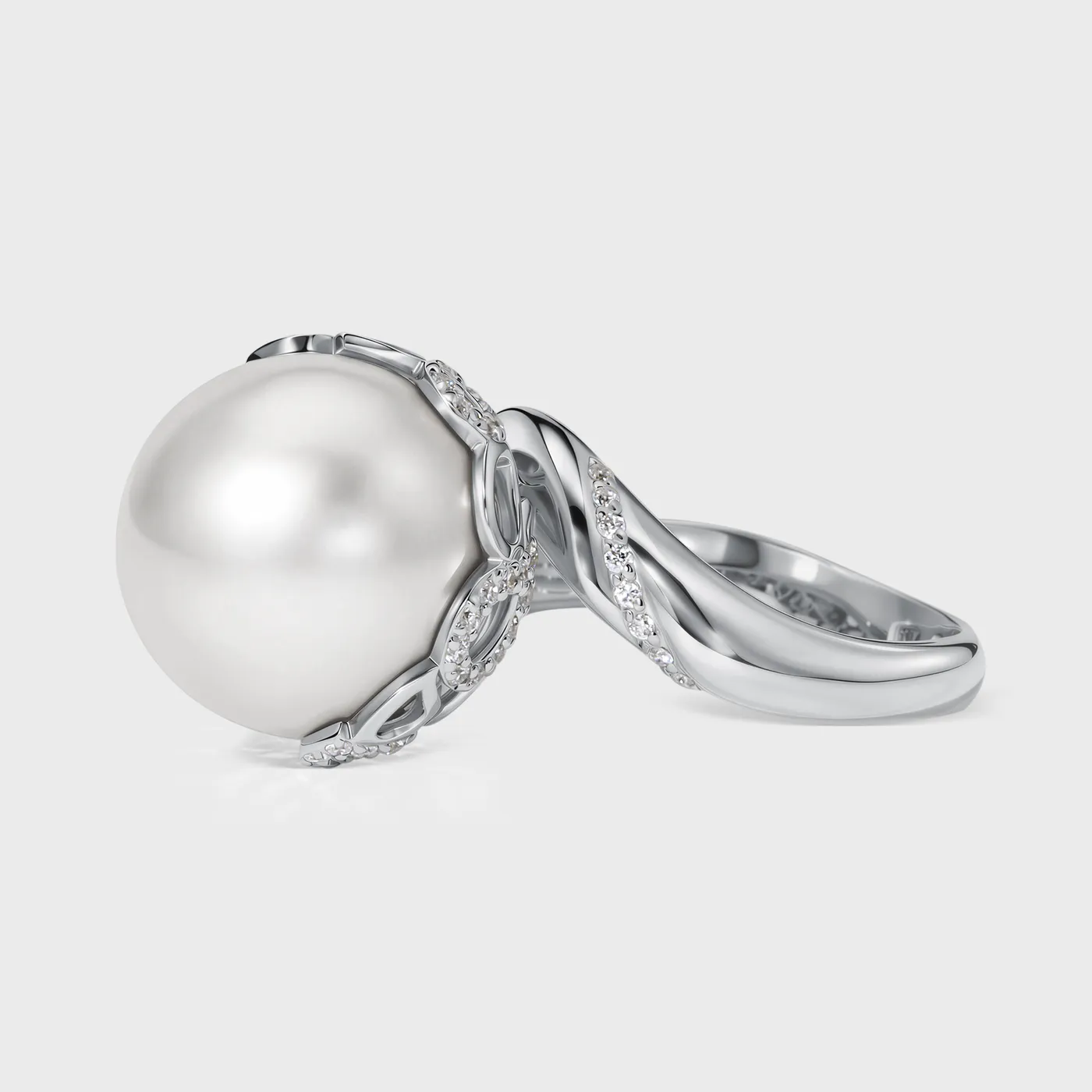 Rangiroa White ring by ValeOro in white gold with a round white pearl and a twisted diamond band, side view