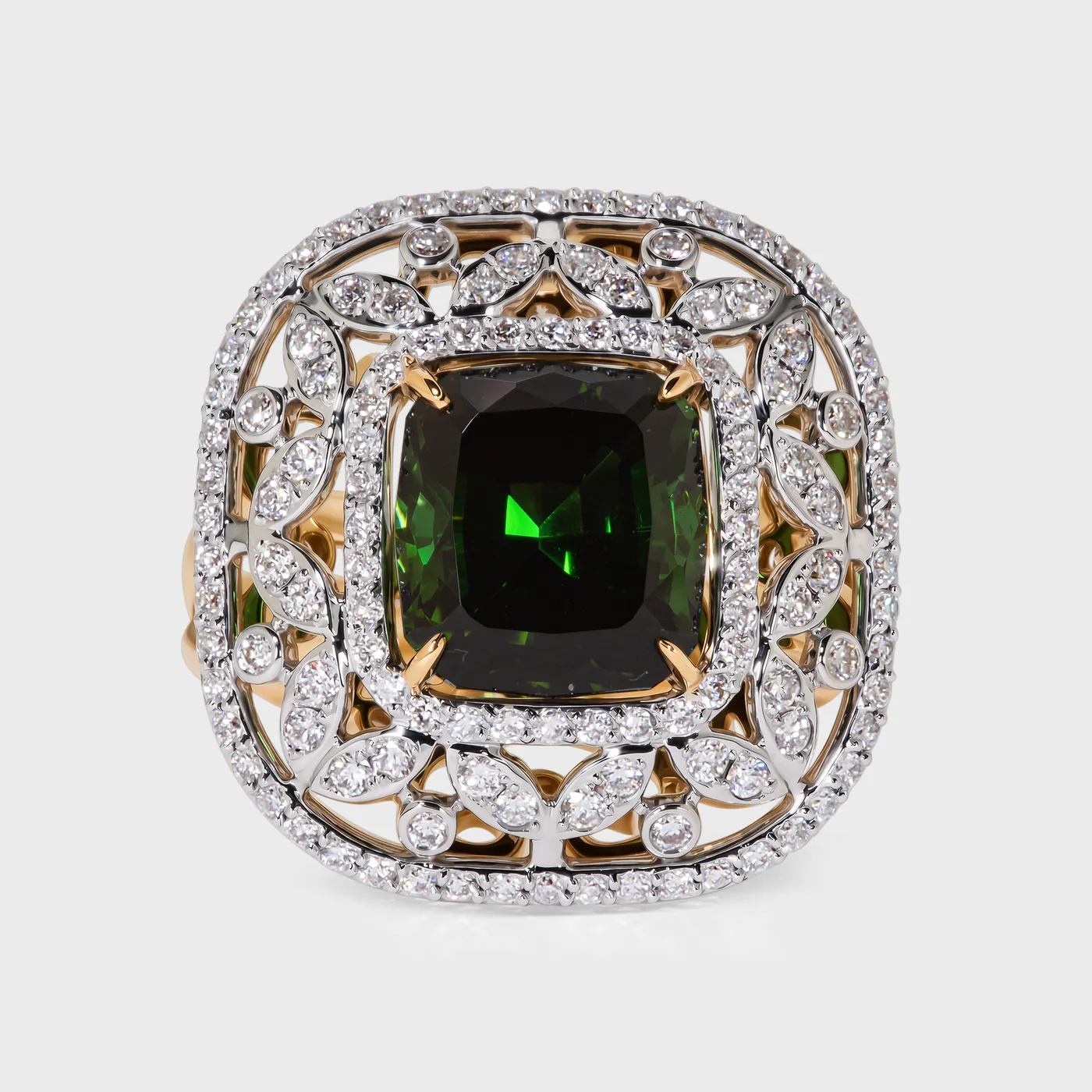 Olivia white gold ring by ValeOro with a green cushion-cut tourmaline framed by an openwork diamond leaf design, front view