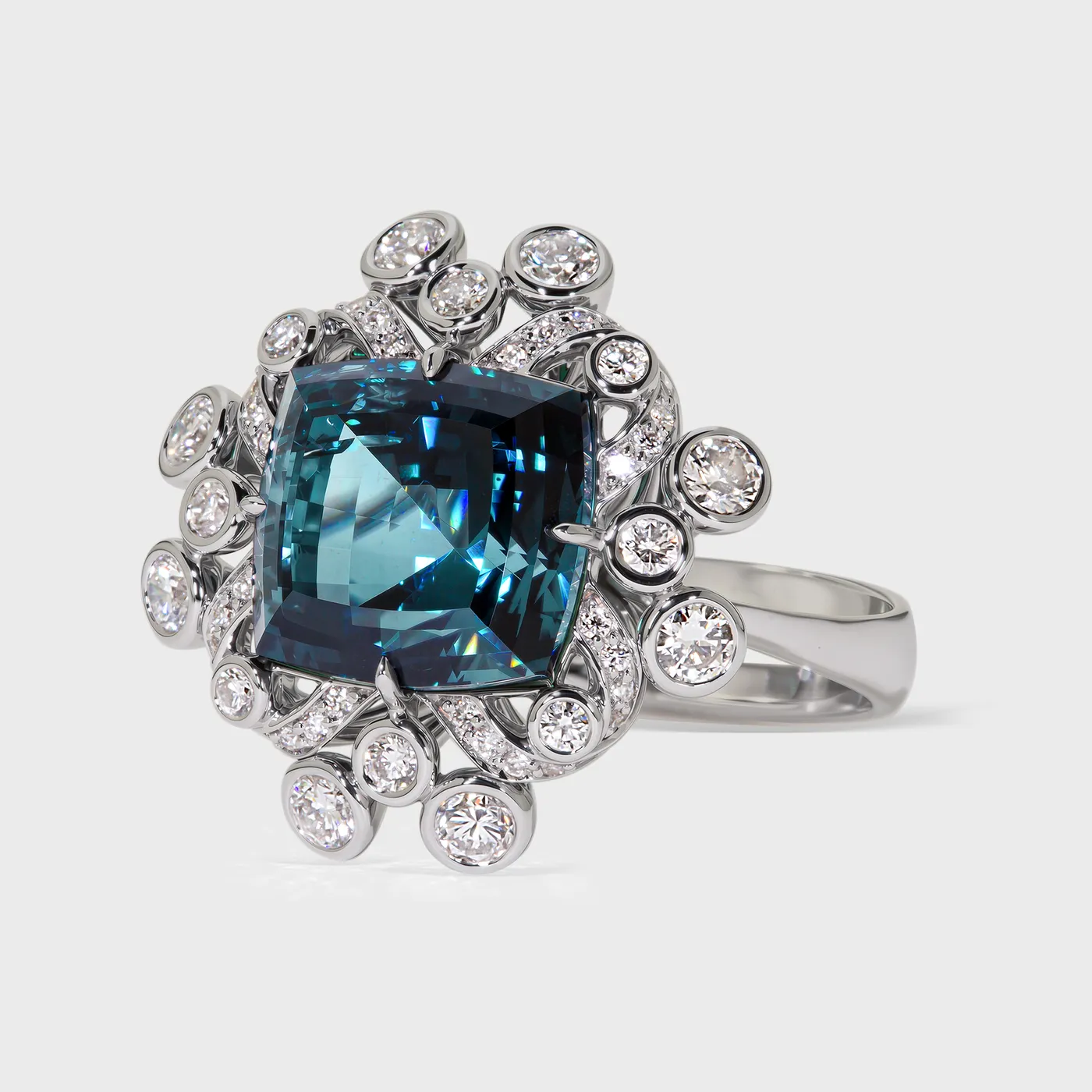 Genova white gold ring by ValeOro with a cushion-cut blue-green tourmaline framed by round diamonds, front view
