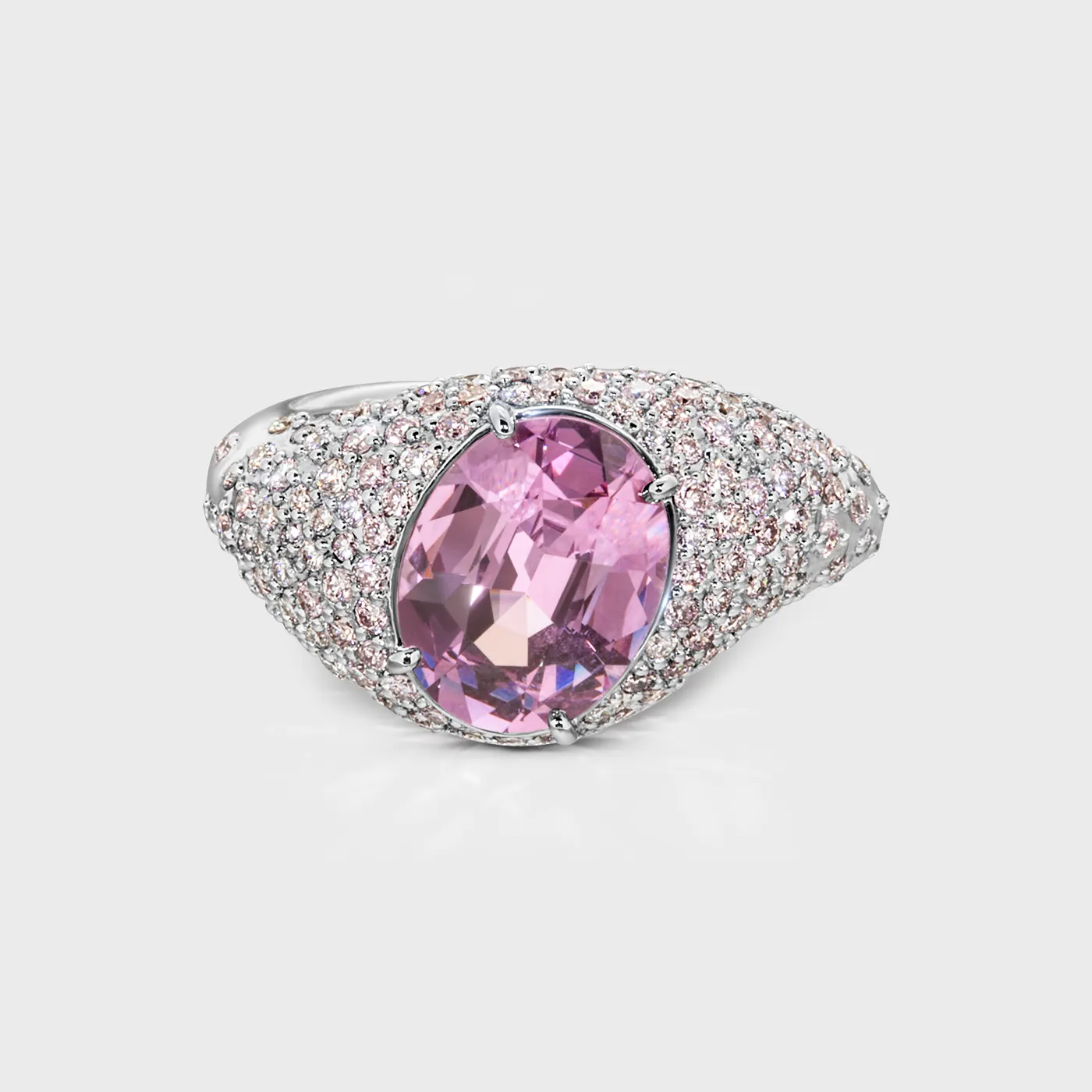Cabo da Roca white gold ring by ValeOro with an oval pink spinel in a domed pavé setting, front view