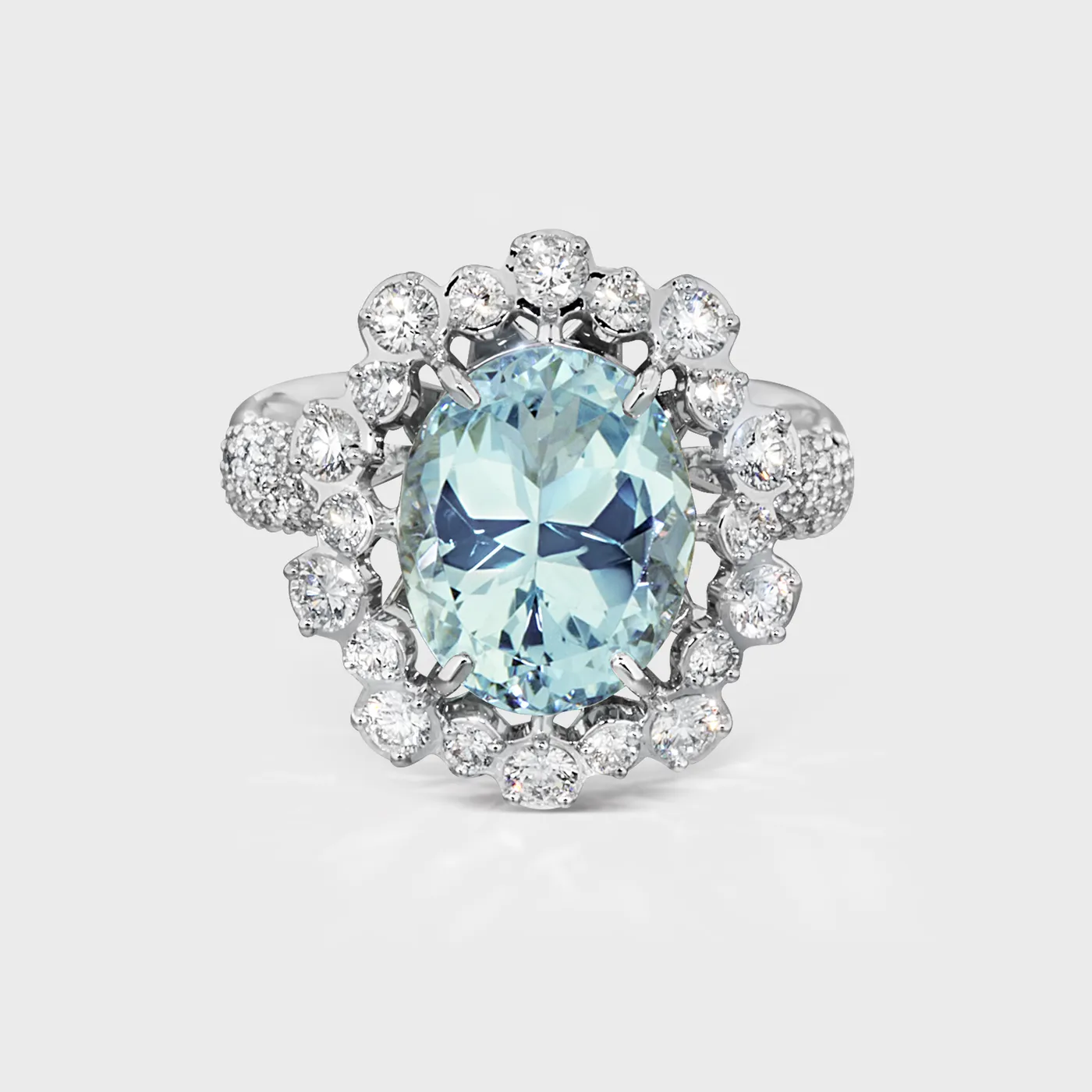 Salema white gold ring by ValeOro with an oval light-blue aquamarine framed by diamonds, front view