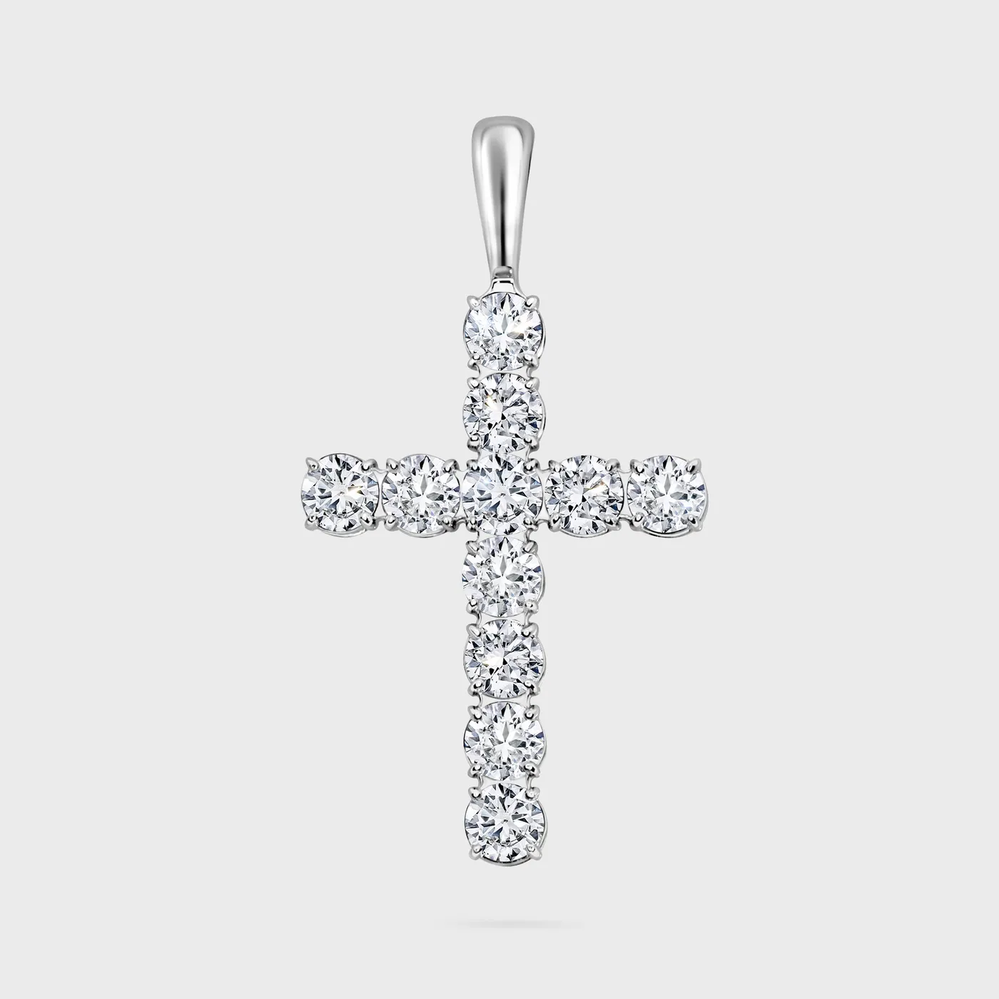 Gloss white gold cross by ValeOro with large round diamonds in open prong settings, front view
