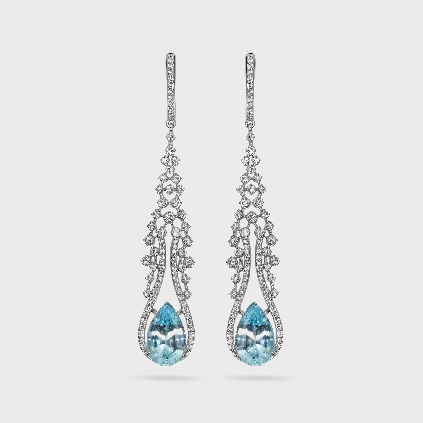 Arabella white gold drop earrings by ValeOro with pear-cut blue aquamarines in an openwork diamond garland, front view