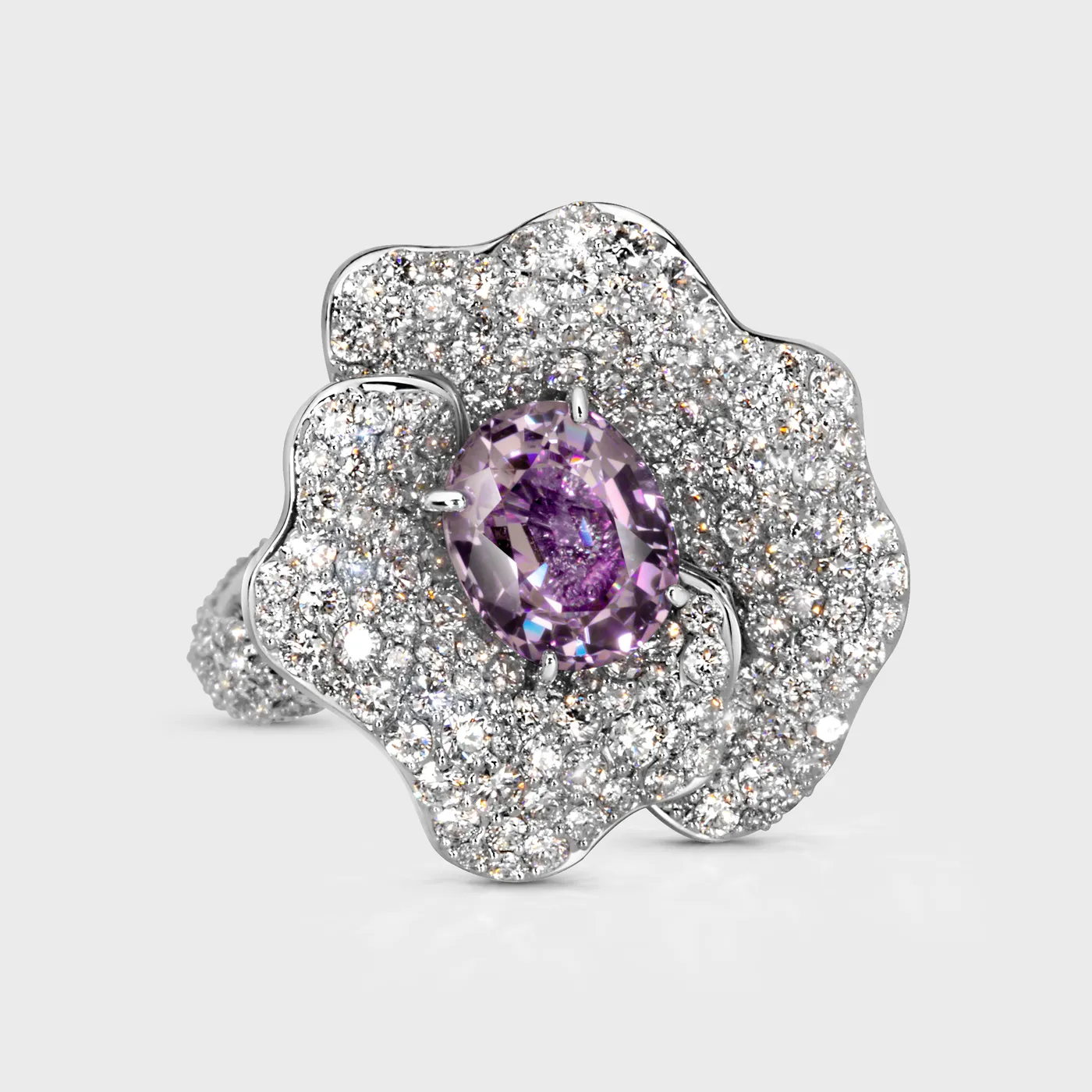 Hermanus white gold ring by ValeOro with an oval violet spinel framed by diamond-paved petals, front view
