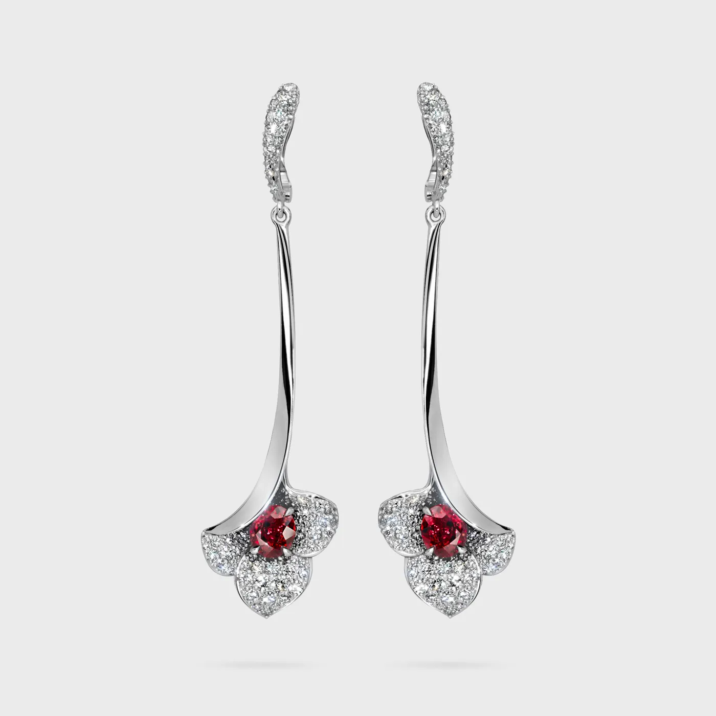 Lily white gold drop earrings by ValeOro with red sapphires in diamond flowers, front view