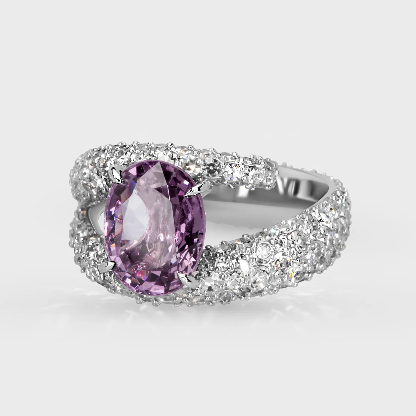 Onrus white gold ring by ValeOro with an oval violet spinel and diamonds covering the band, three-quarter view