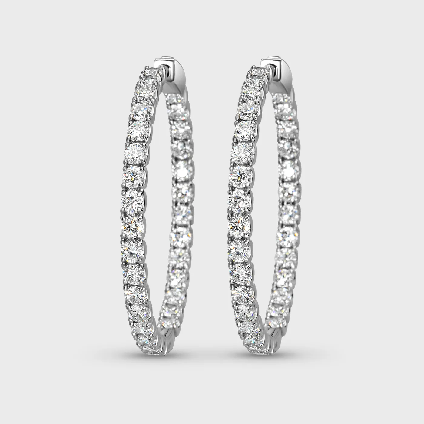 Antibes white gold hoop earrings by ValeOro with diamonds set inside and out, front view