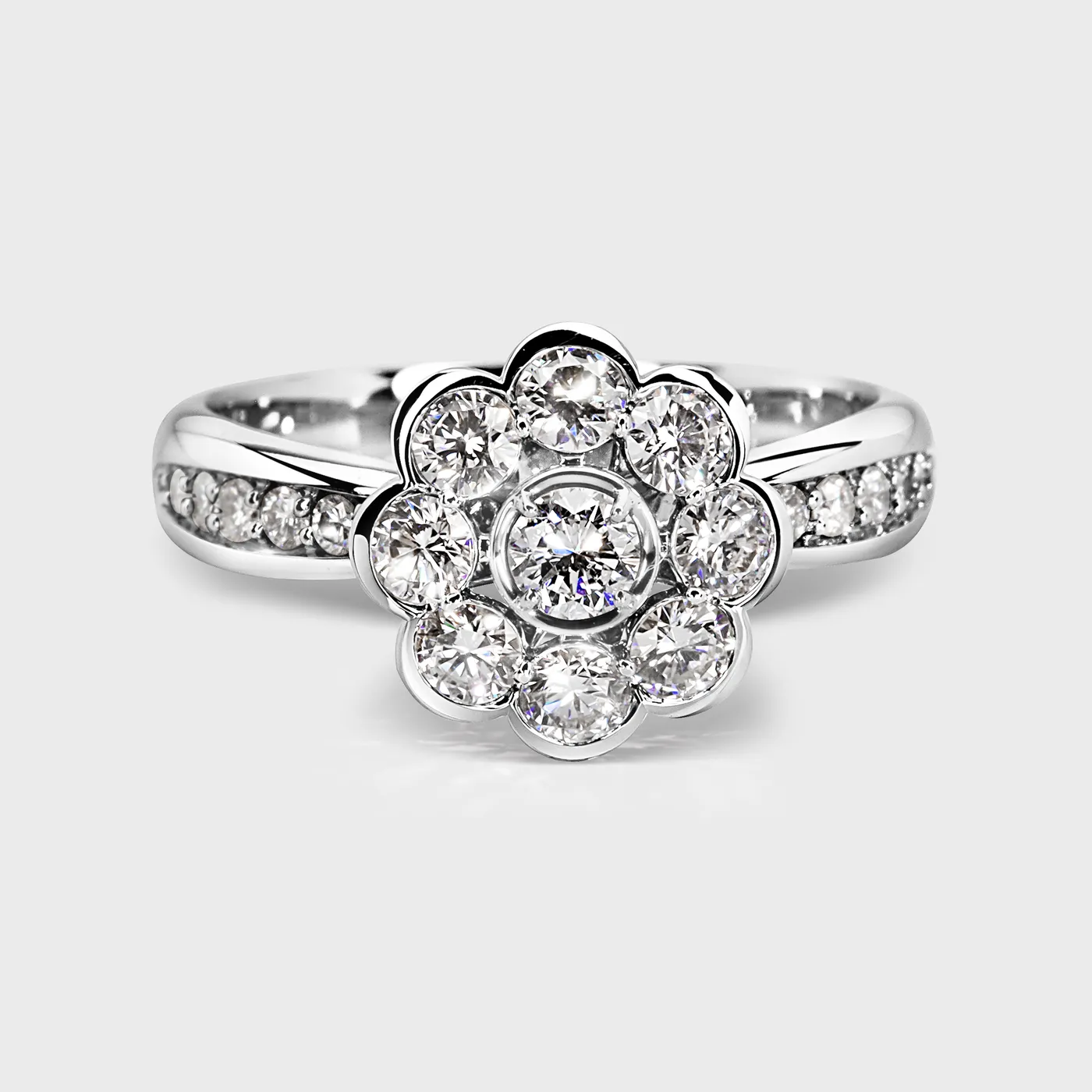 Amaryllis white gold diamond ring by ValeOro with a flower-shaped cluster and a pavé-set band, front view