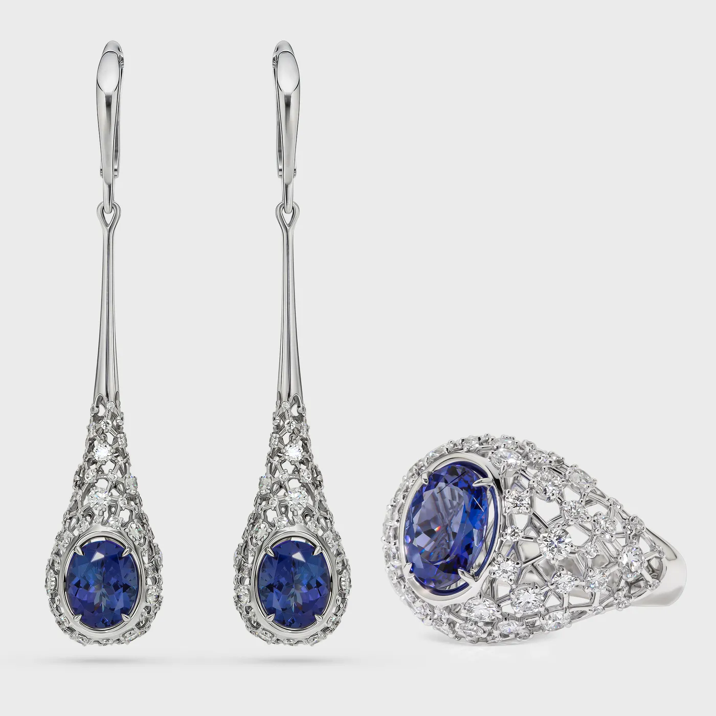 Venezia white gold set by ValeOro with oval blue-violet tanzanites in openwork diamond settings, earrings and ring