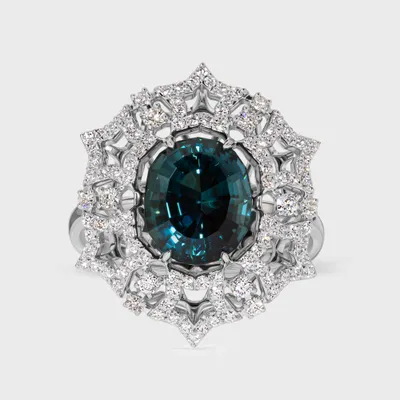 Gemstones Star white gold ring by ValeOro with an oval blue-green tourmaline in a star-shaped diamond halo, front view