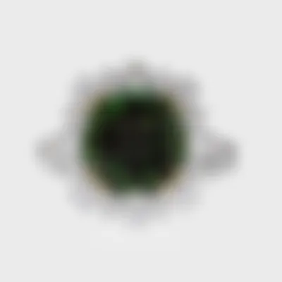 Benissa white gold ring by ValeOro with a cushion-cut green tourmaline framed by a diamond halo, front view