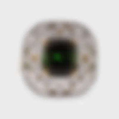 Olivia white gold ring by ValeOro with a green cushion-cut tourmaline framed by an openwork diamond leaf design, front view