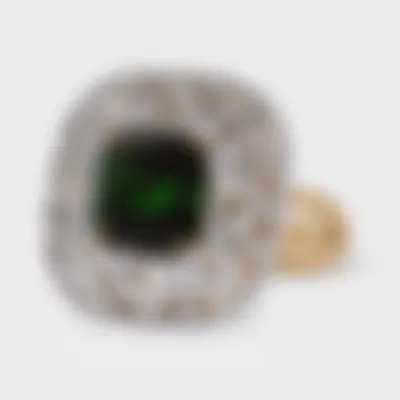 Olivia white gold ring by ValeOro with a green tourmaline in an openwork leaf-motif diamond frame, three-quarter view
