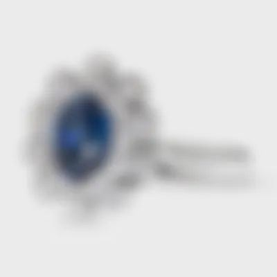 Nautico white gold ring by ValeOro with a blue sapphire in a floral diamond composition, side view