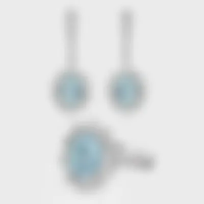 Salema white gold jewelry set by ValeOro with oval blue aquamarines framed by diamond halos, ring and drop earrings