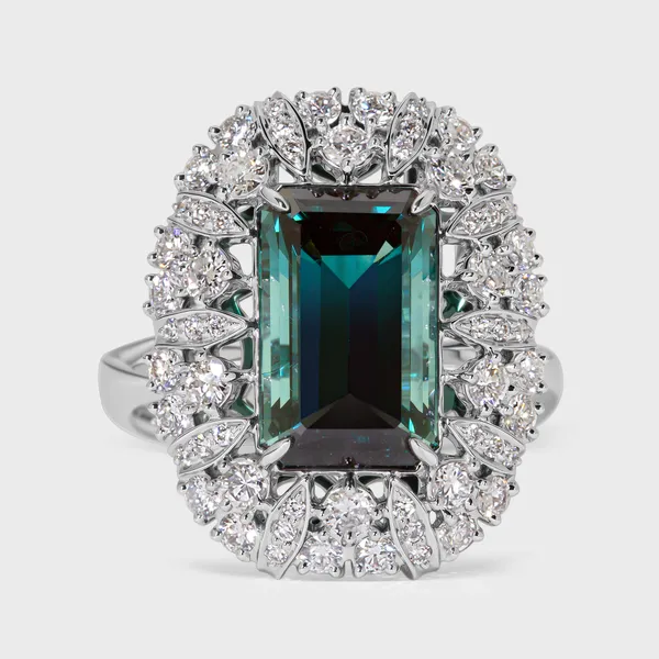 Cinquale white gold ring by ValeOro with an emerald-cut blue-green tourmaline framed by an openwork diamond halo, front view