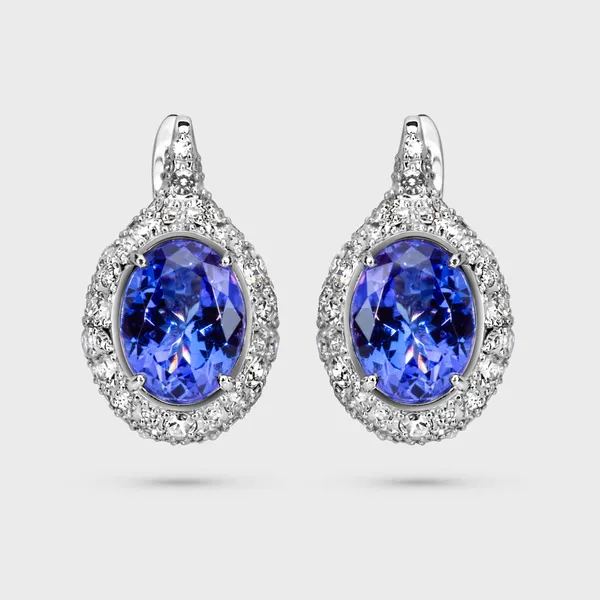 Arctic white gold earrings by ValeOro with oval blue-violet tanzanites framed by diamonds, front view