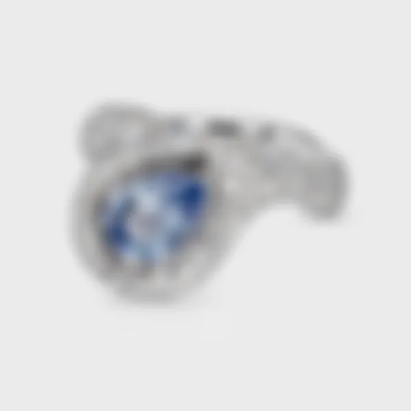 Yin-Yang Sapphire white gold ring by ValeOro with a pear-shaped pale blue sapphire framed by pavé diamonds, front view