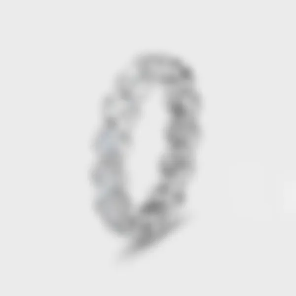 Clover white gold ring by ValeOro with round bezel-set diamonds and a clover-shaped openwork gallery, three-quarter view