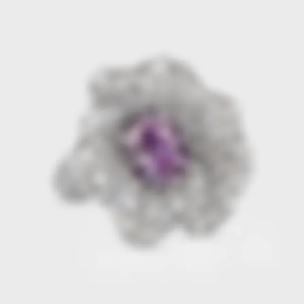 Hermanus white gold ring by ValeOro with an oval violet spinel framed by diamond-paved petals, front view