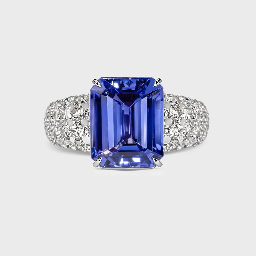Sorteny Tanzanite white gold ring by ValeOro with an emerald-cut blue-violet tanzanite and diamond shoulders, front view
