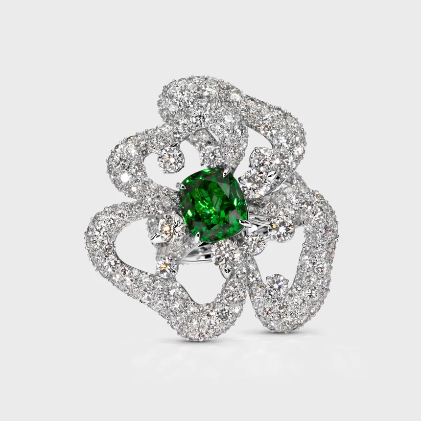 Protea Tsavorite white gold ring by ValeOro with a green cushion-cut tsavorite framed by openwork diamond petals, front view