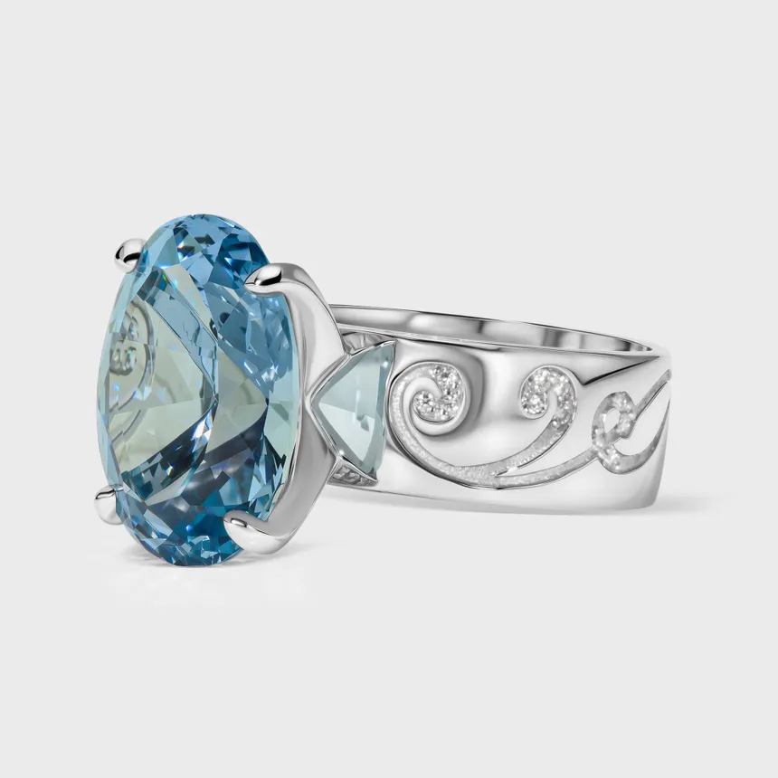 Chambord white gold ring by ValeOro with an oval blue aquamarine and a scrollwork band set with diamonds, three-quarter view