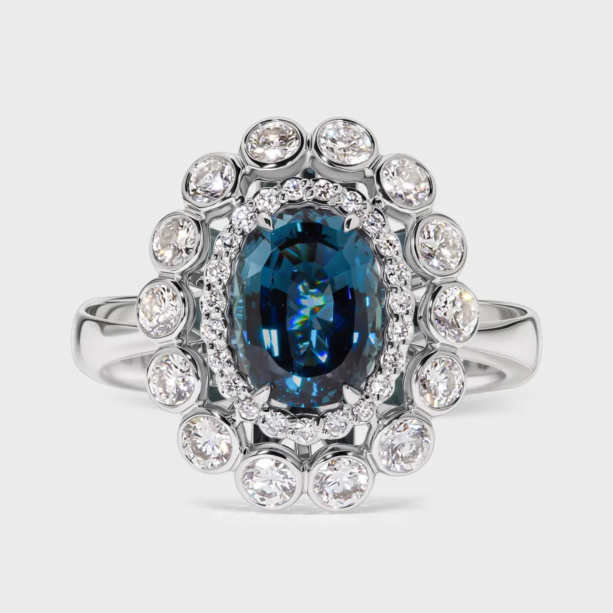 Sea white gold ring by ValeOro with an oval blue-green tourmaline in a double-halo floral diamond setting, front view