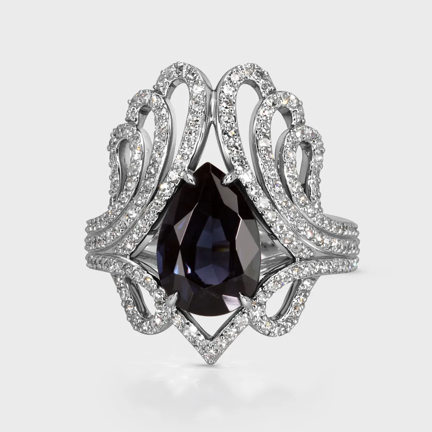 Regalia white gold ring by ValeOro with a pear-shaped blue spinel set in an openwork diamond crown, front view