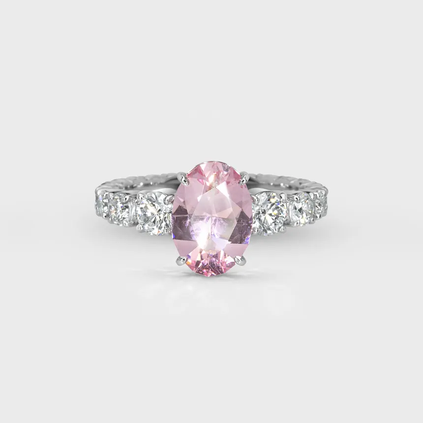 Roselie white gold ring by ValeOro with an oval pink morganite flanked by round diamonds, front view