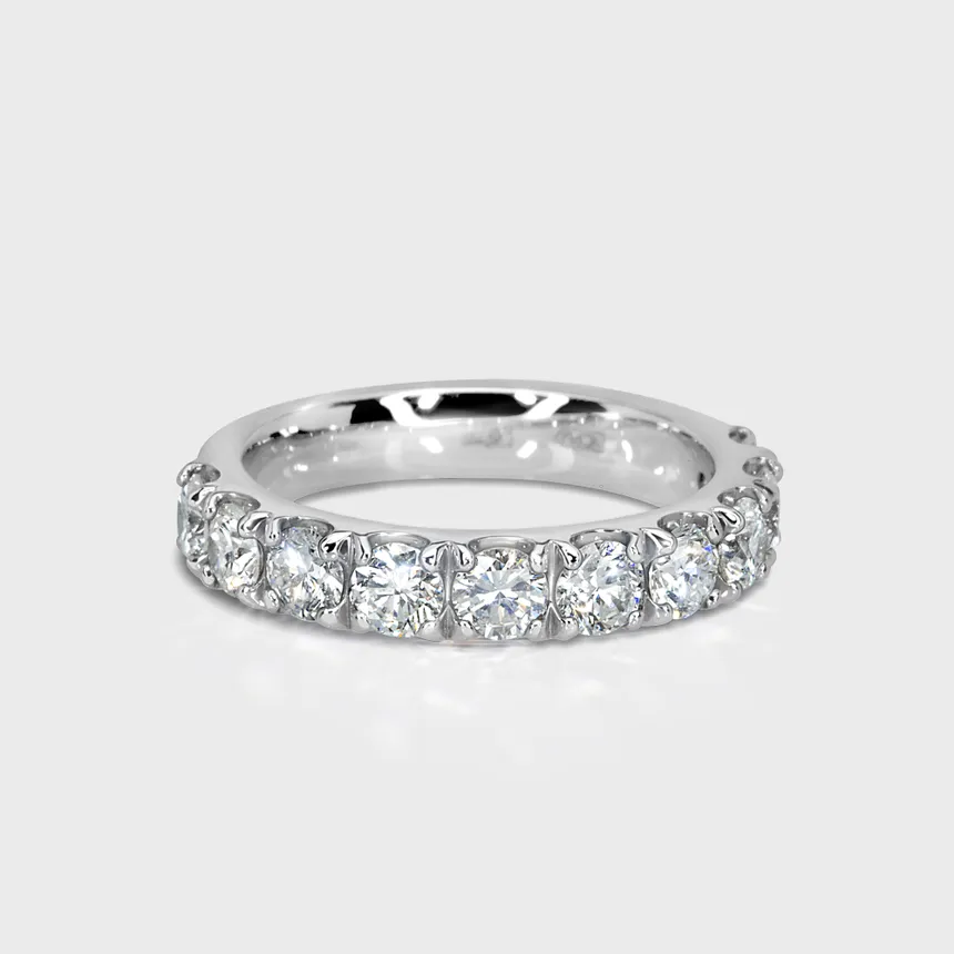 Gloss white gold ring by ValeOro with a line of round brilliant diamonds, front view