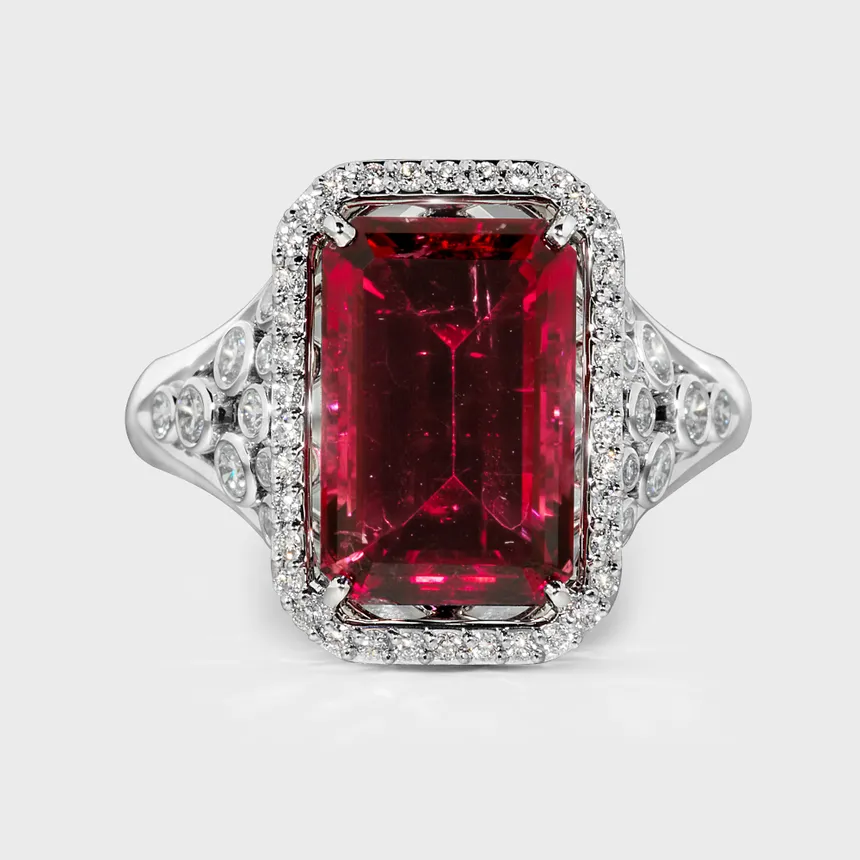 Alicante white gold ring by ValeOro with an emerald-cut red tourmaline framed by a diamond halo, front view
