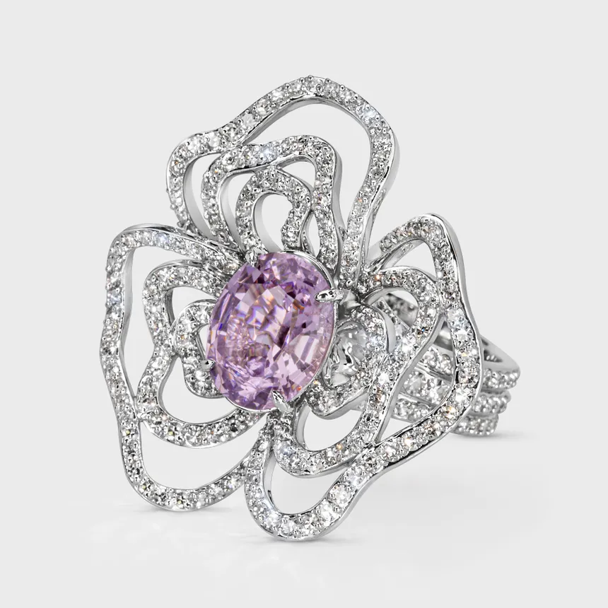 Moraea white gold ring by ValeOro with an oval lavender spinel framed by openwork diamond petals, three-quarter view