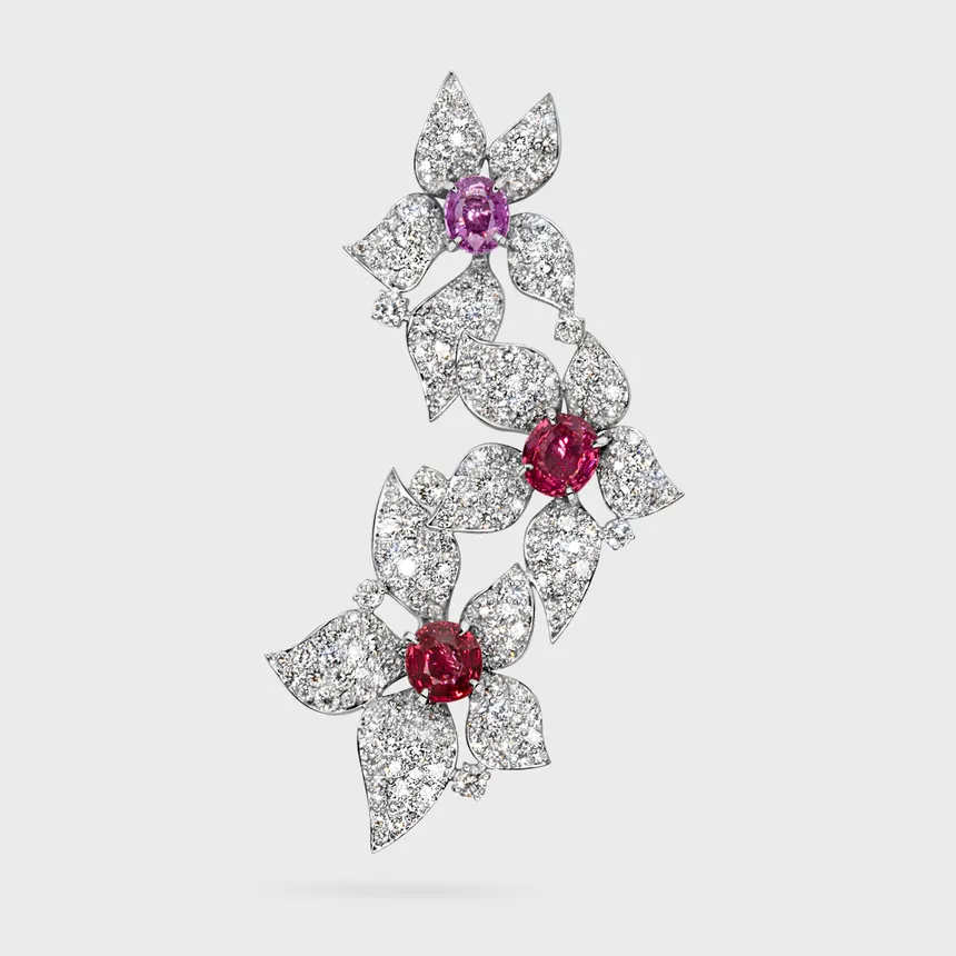 Lily white gold pendant by ValeOro with three diamond flowers centered on oval pink and red spinels, front view