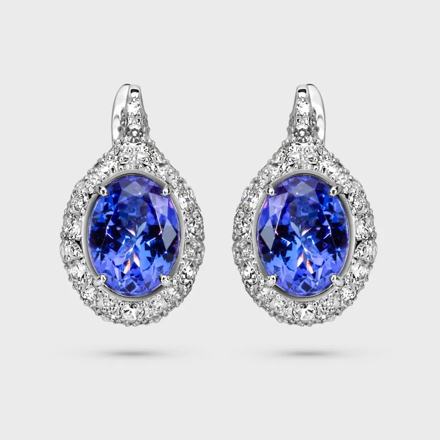 Arctic white gold earrings by ValeOro with oval blue-violet tanzanites framed by diamonds, front view