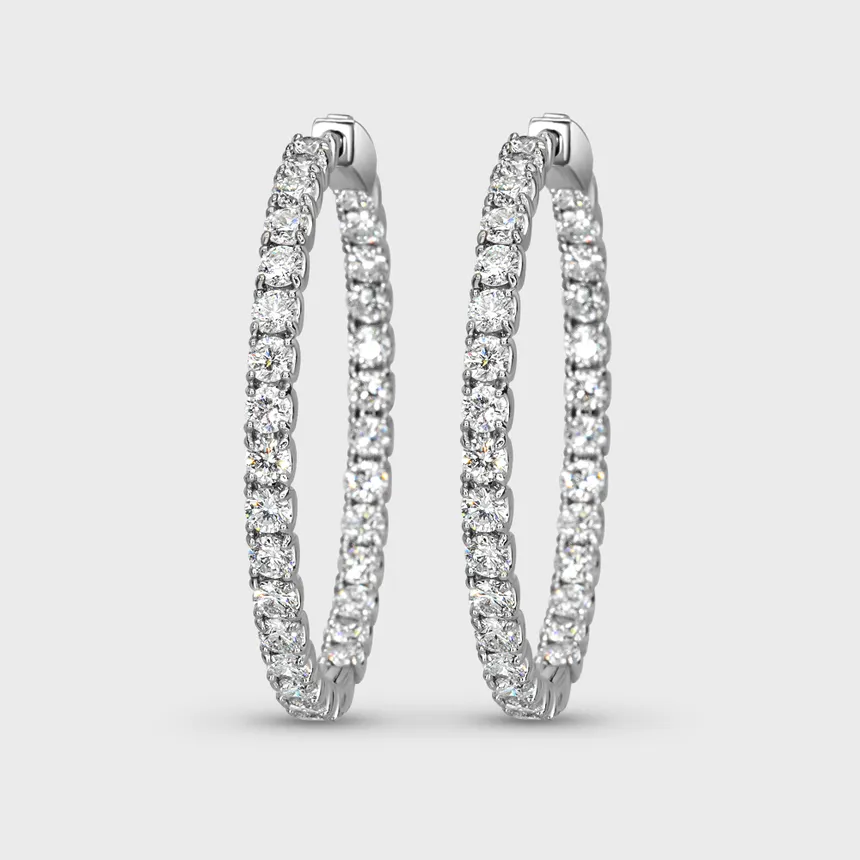 Antibes white gold hoop earrings by ValeOro with diamonds set inside and out, front view