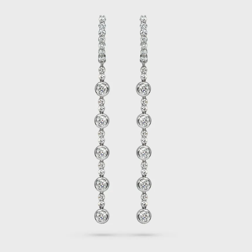 Asti white gold drop earrings by ValeOro with a vertical cascade of bezel-set round diamonds, front view