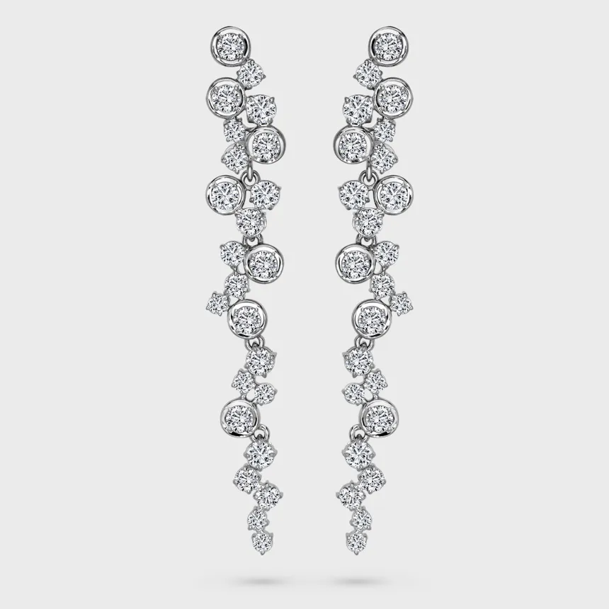 Clusters white gold drop earrings by ValeOro with round diamonds cascading in articulated clusters, front view