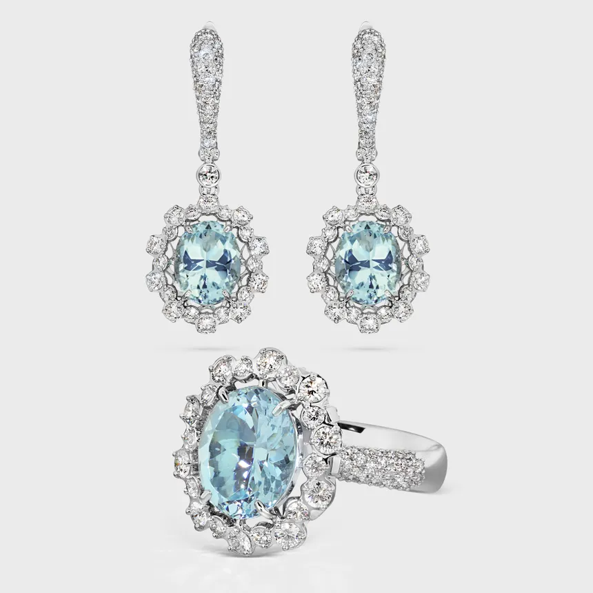 Salema white gold jewelry set by ValeOro with oval blue aquamarines framed by diamond halos, ring and drop earrings