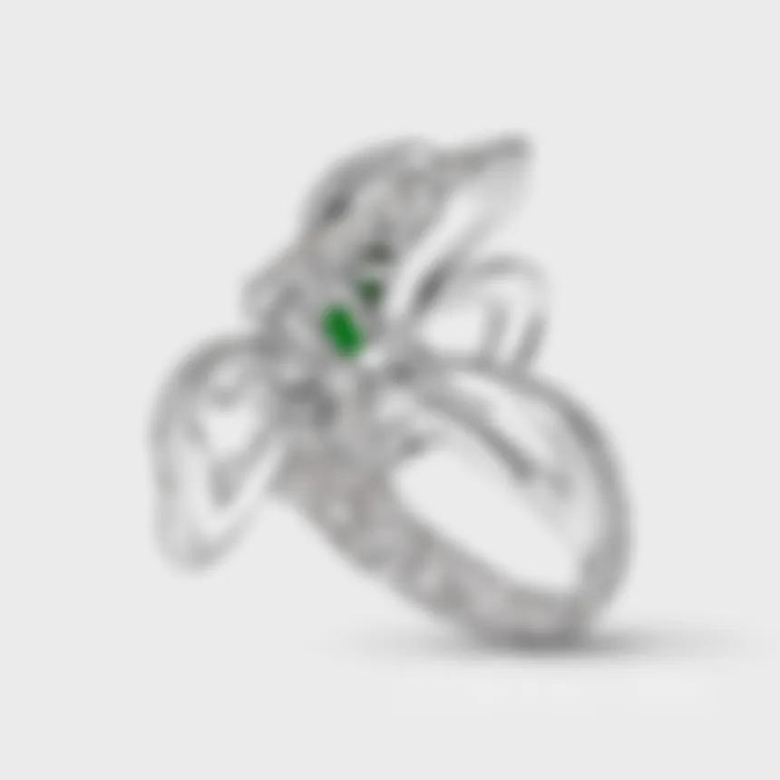 Protea Tsavorite white gold ring by ValeOro, sculpted openwork gallery around a green tsavorite, side view