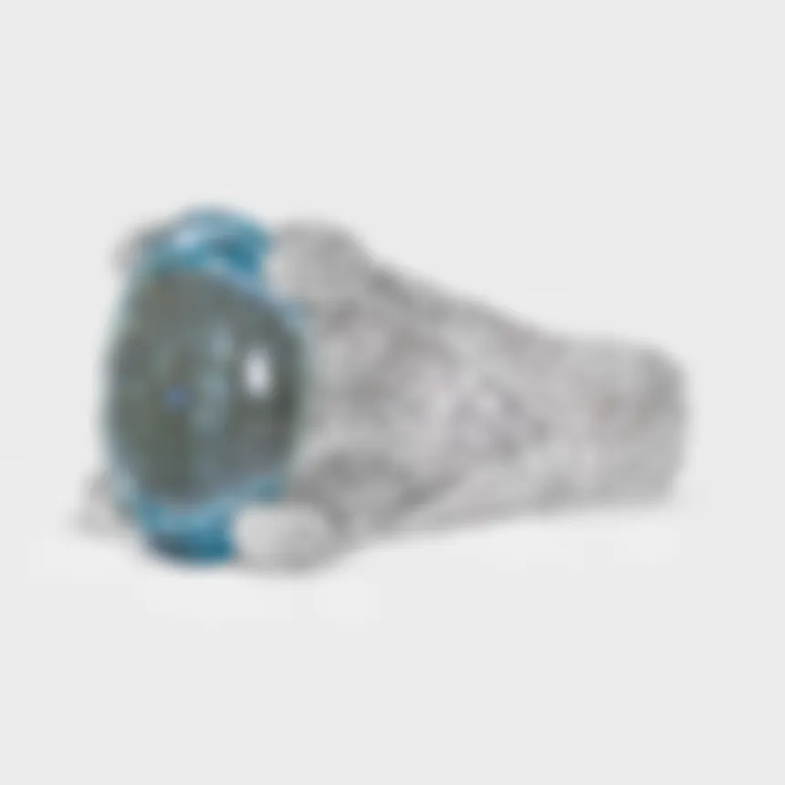 Forte dei Marmi white gold ring by ValeOro with an oval aquamarine and openwork pavé diamond shoulders, three-quarter view
