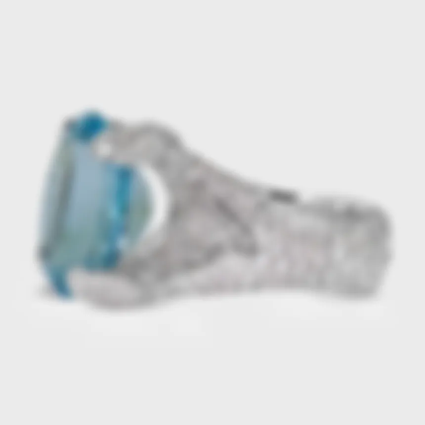Forte dei Marmi white gold ring by ValeOro with an oval aquamarine and a pavé diamond band, side view