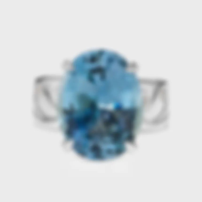 Chambord white gold ring by ValeOro with a large oval blue aquamarine in a four-prong setting, front view
