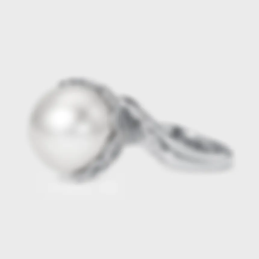 Rangiroa White ring by ValeOro in white gold with a round white pearl and a twisted diamond band, side view
