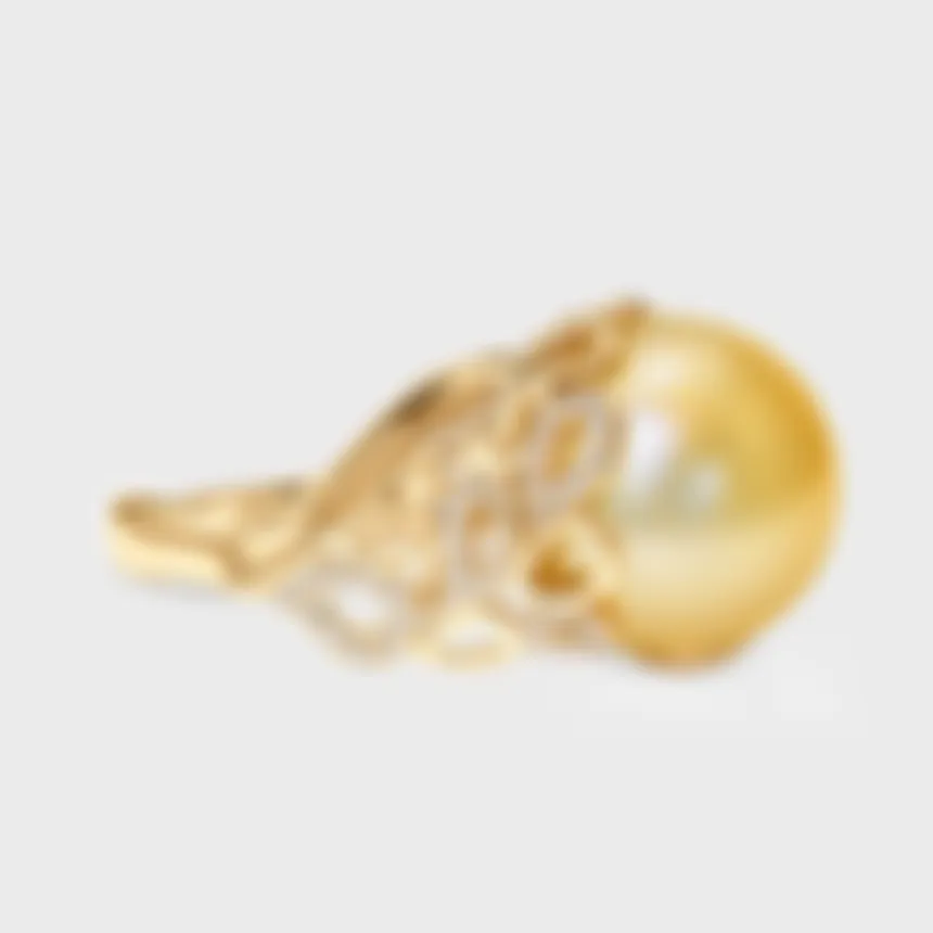 Rangiroa Yellow ring in yellow gold by ValeOro with a golden South Sea pearl and openwork diamond loops, three-quarter view