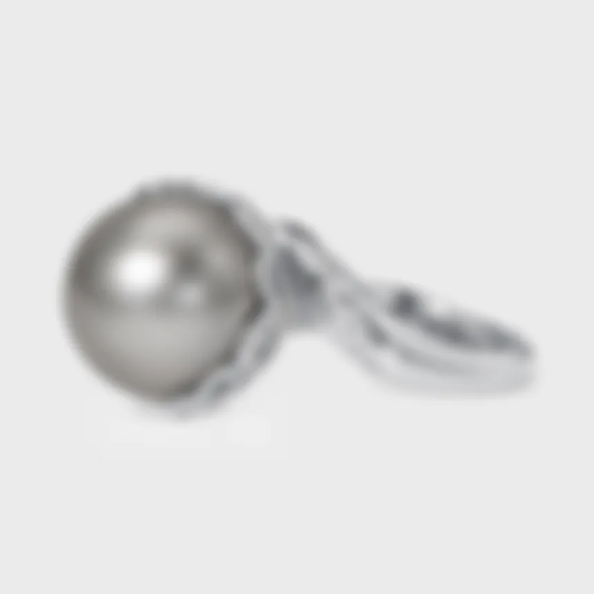 Rangiroa Black white gold ring by ValeOro with a large grey-black pearl in an openwork diamond setting, side view