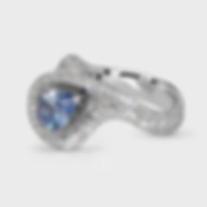 Yin-Yang Sapphire white gold ring by ValeOro with a light blue pear sapphire encircled by pavé diamonds, three-quarter view