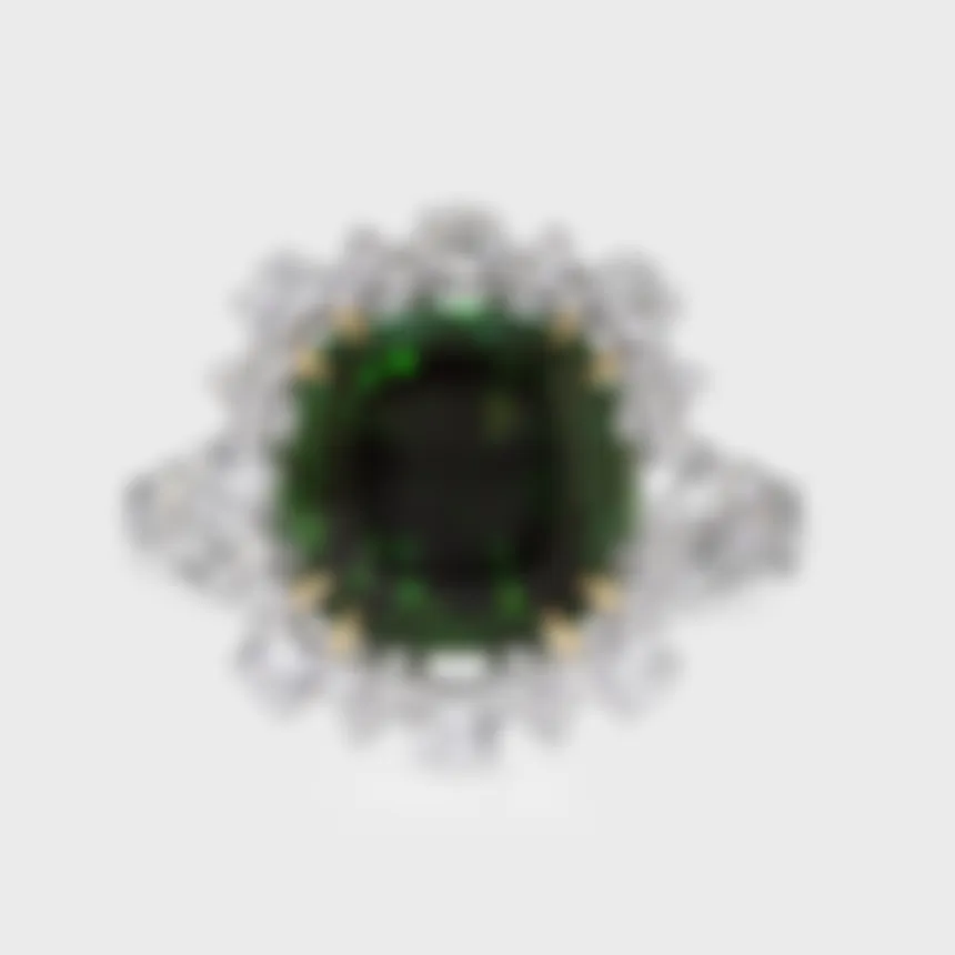 Benissa white gold ring by ValeOro with a cushion-cut green tourmaline framed by a diamond halo, front view